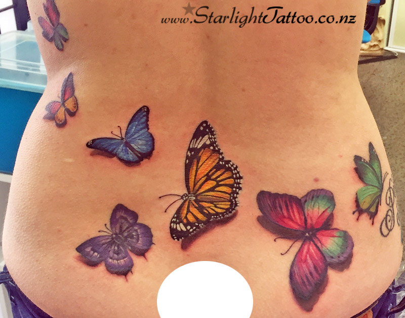 Purple butterfly tattoo cover up