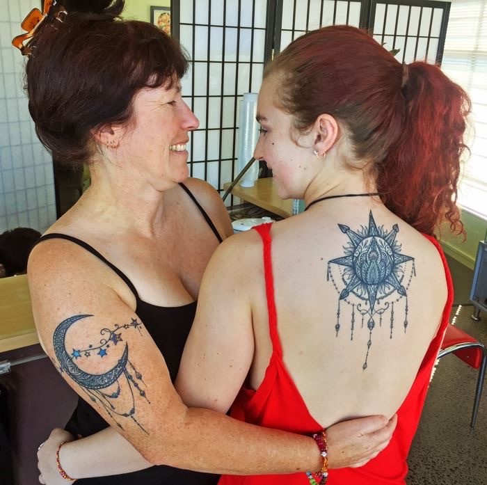 Mother and daughter tattoos