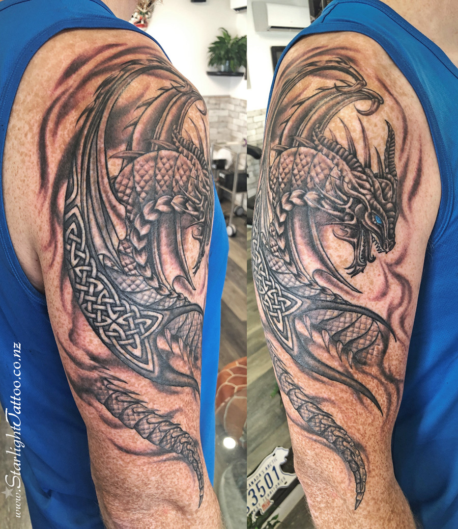 Dragon tattoo in black and grey - fantasy realism style