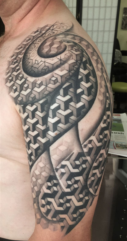 Geometrical tattoo in black ink