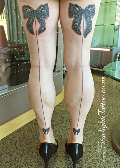 Lace stocking tattoo - grayscale ornamental design