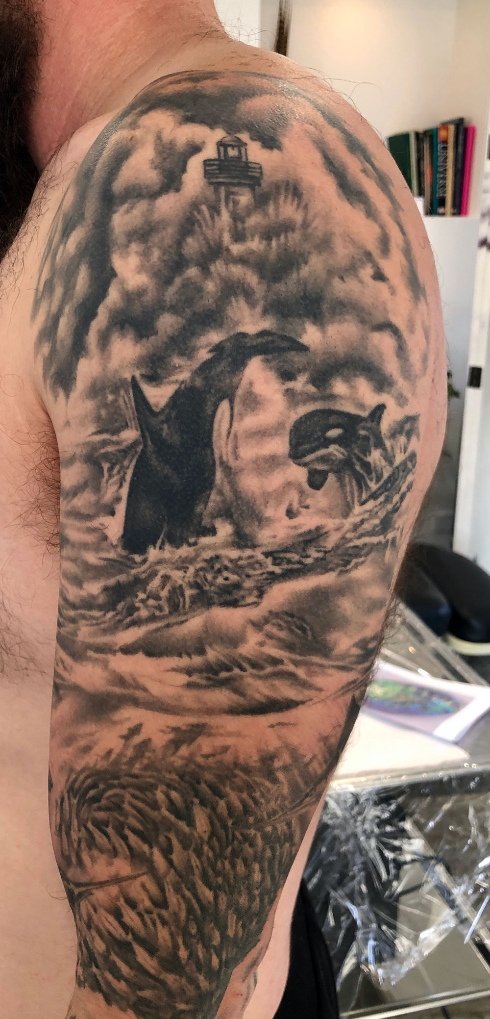New Zealand ocean sleeve tattoo - Orcas in wild waters