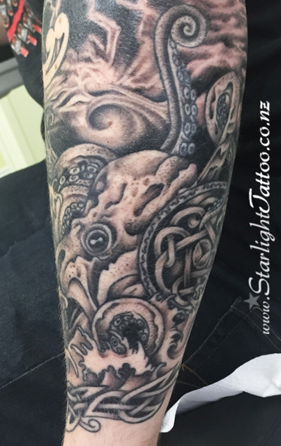 Octopus tattoo in black and grey - marine life realism