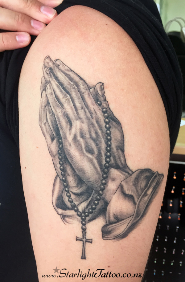 Praying hands tattoo - spiritual grayscale design