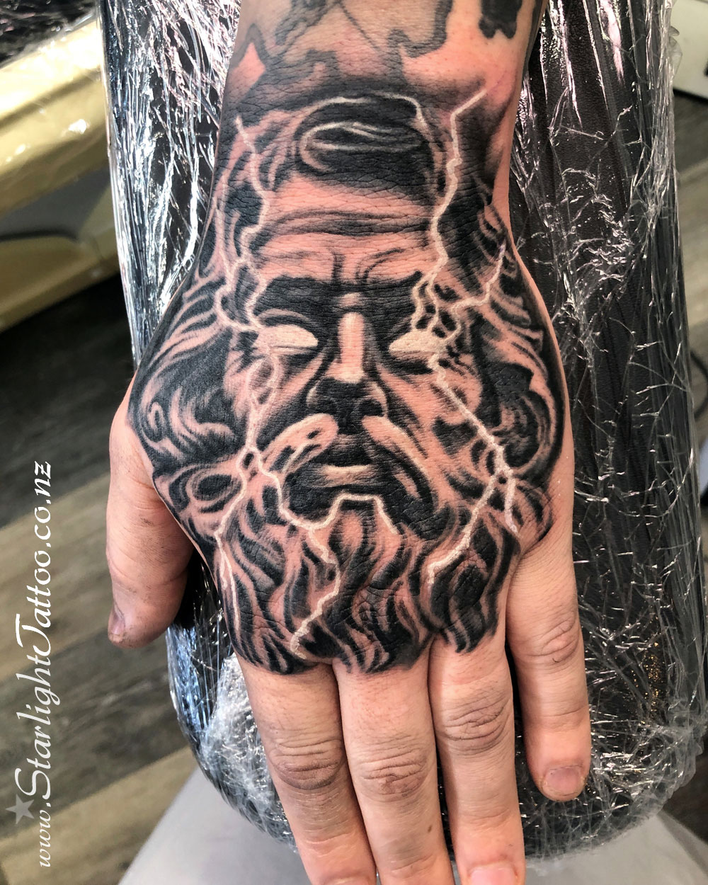 Zeus tattoo in black and grey - mythological portrait realism