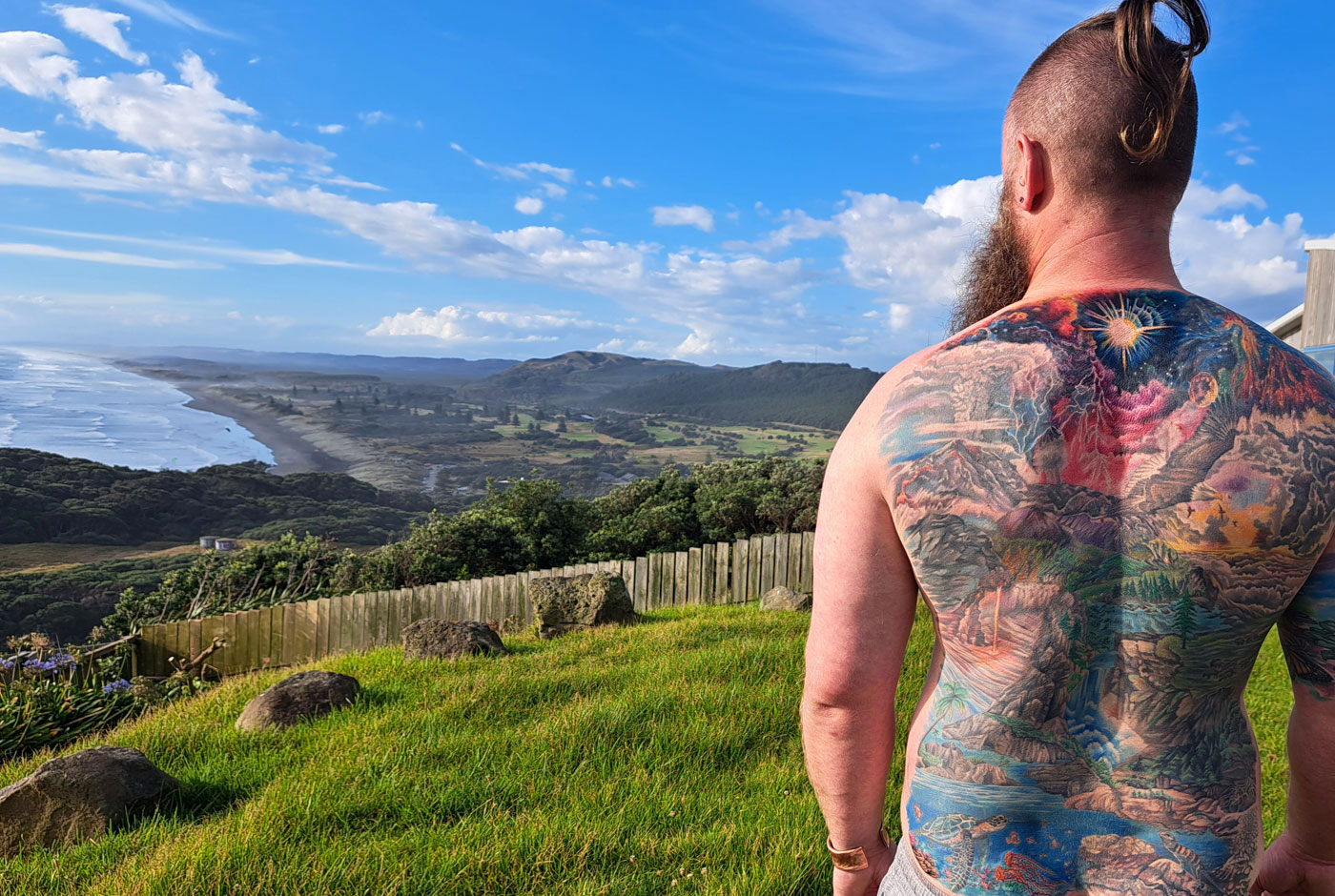 A full-back tattoo, flowing with power and purpose
