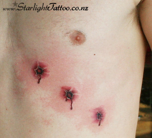 Creative interpretation of gun shot - custom colour tattoo design