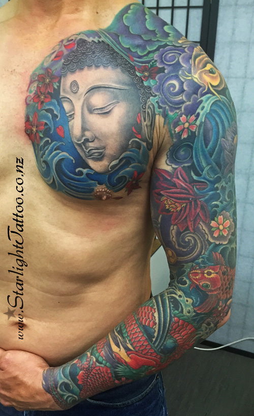 Japanese sleeve featuring koi and waves - colour storytelling through ink