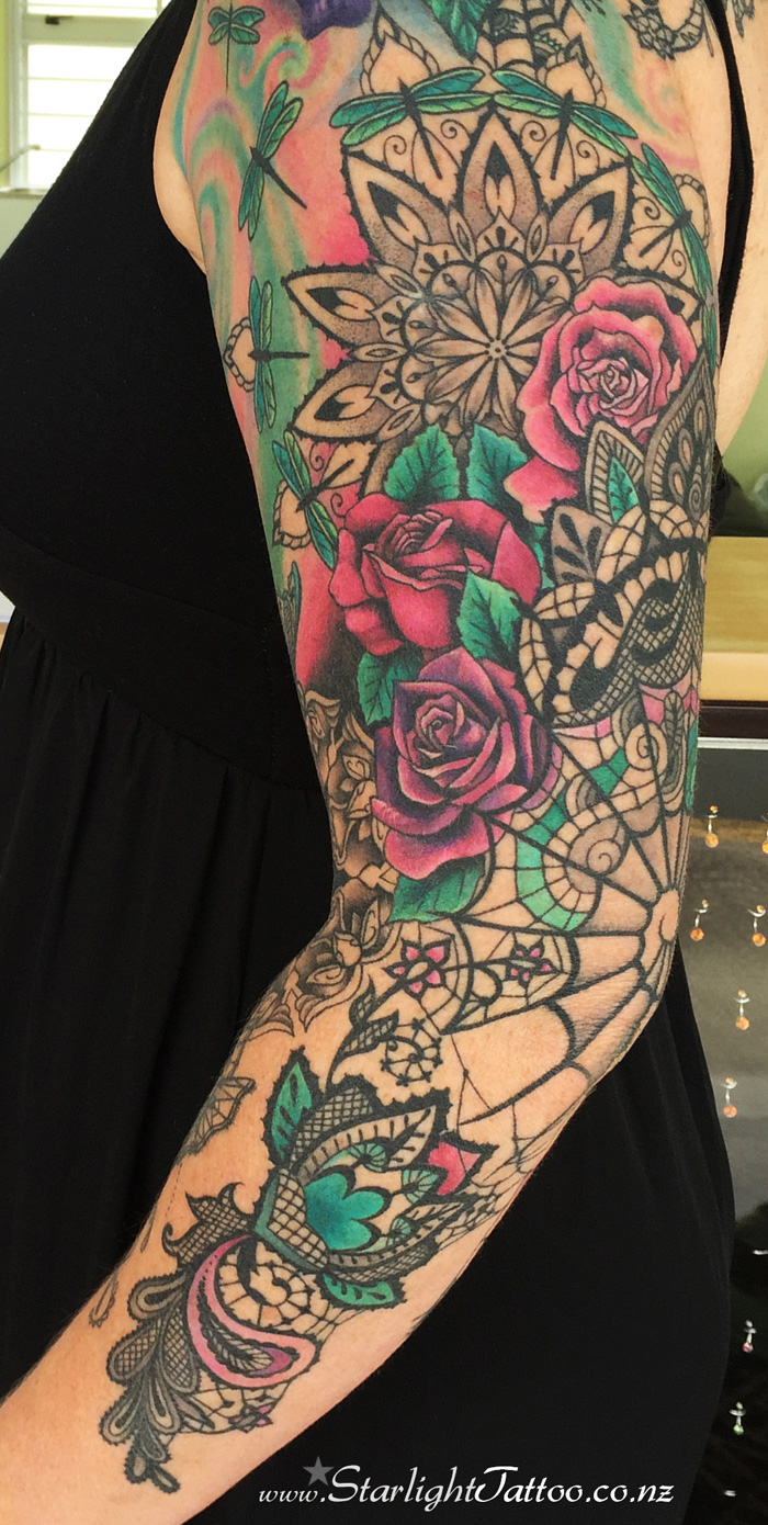 Expressive tattoo art of lace mandalas and florals