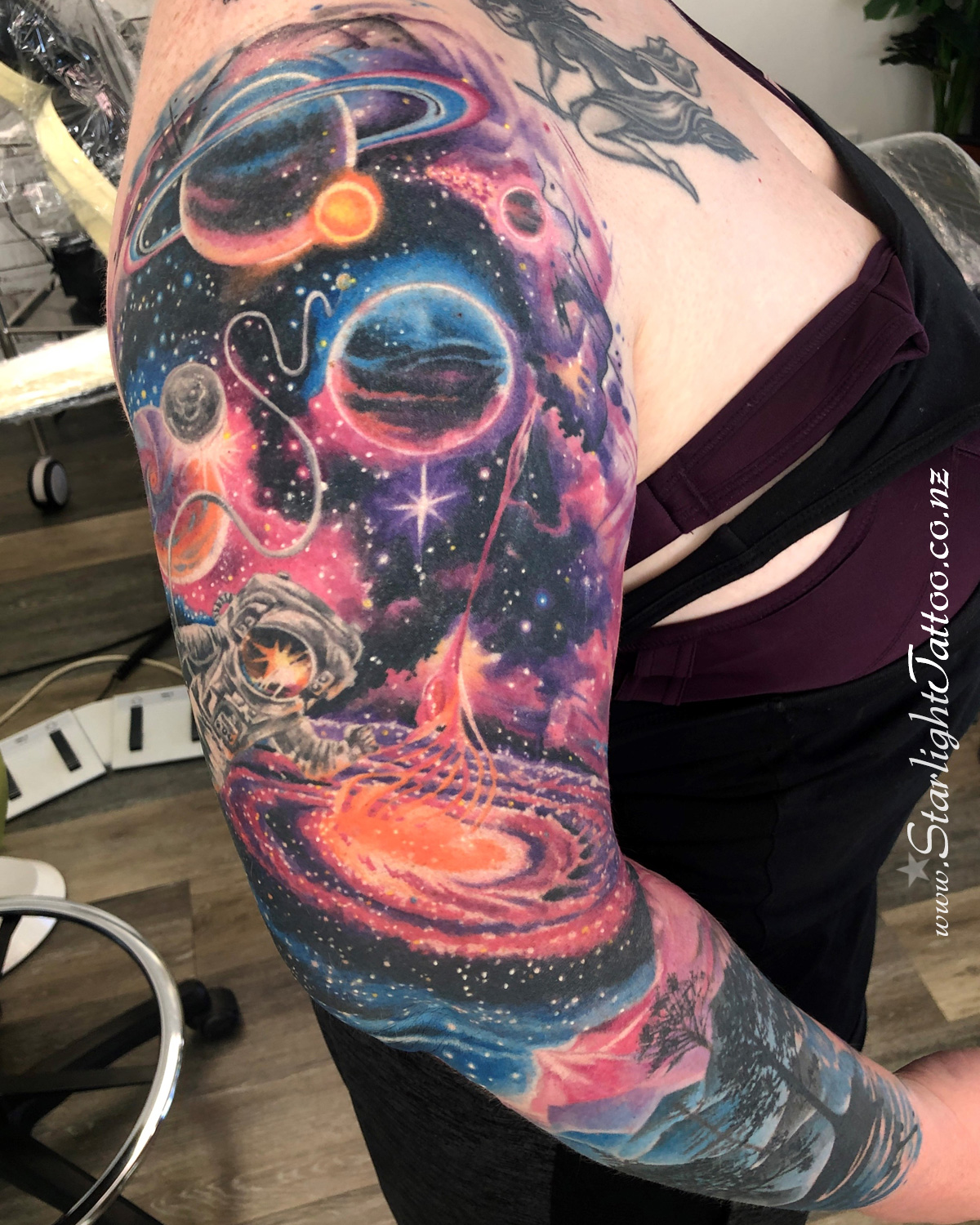 Nebula-inspired sleeve with glowing planets - vivid colour gradient and depth