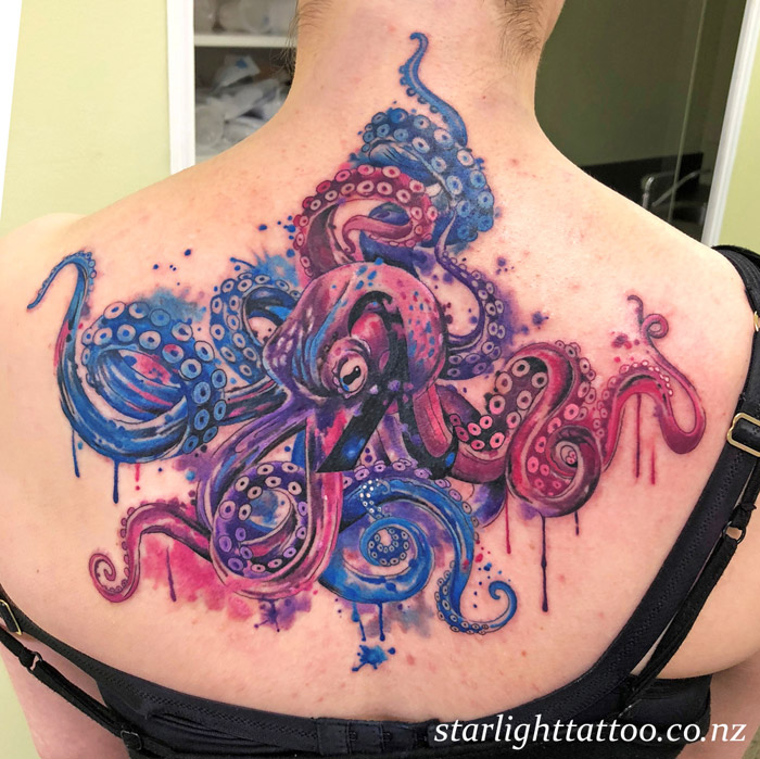 A watercolor octopus drifts across the skin