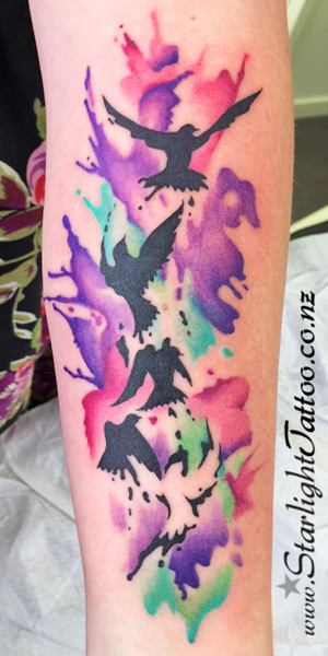 Tattoo art of a watercolour tattoo - unique tattoo composition