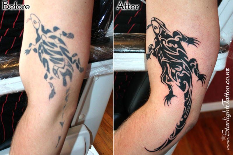 Black ink tribal lizard tattoo refreshed with clean lines